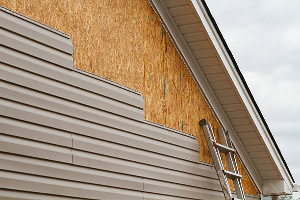 Professional Siding Repair technician working in Wolcott, CT